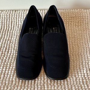 Stuart Weizmann blue slip on loafers.